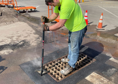 Catch basin repair in a commercial parking lot