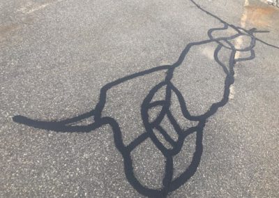 Commercial parking lot crack sealing