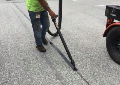 Commercial parking lot crack sealing