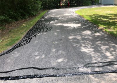 Residential driveway crack sealing