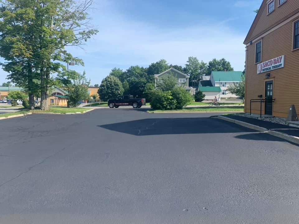 Sealcoating a driveway in Portland, Maine