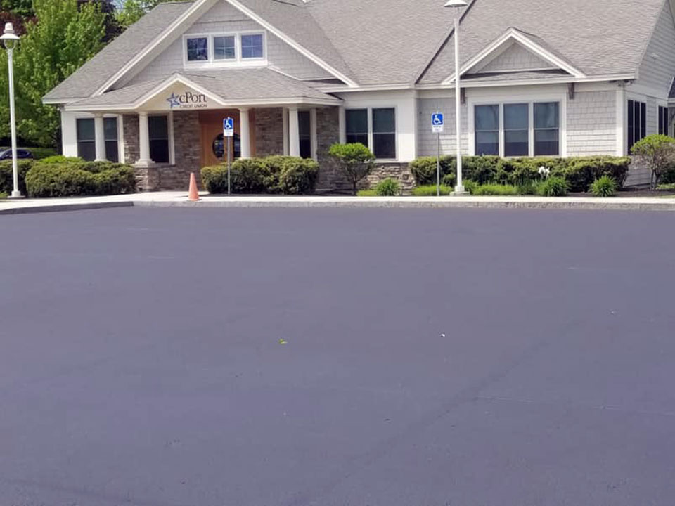 An Addition and patch repair to a residential driveway in Maine